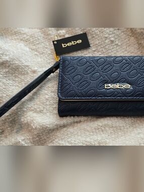 Bebe Navy Embossed Logo Wristlet Phone Wallet with Gold Hardware